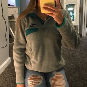 Gray and teal Patagonia fleece pullover
